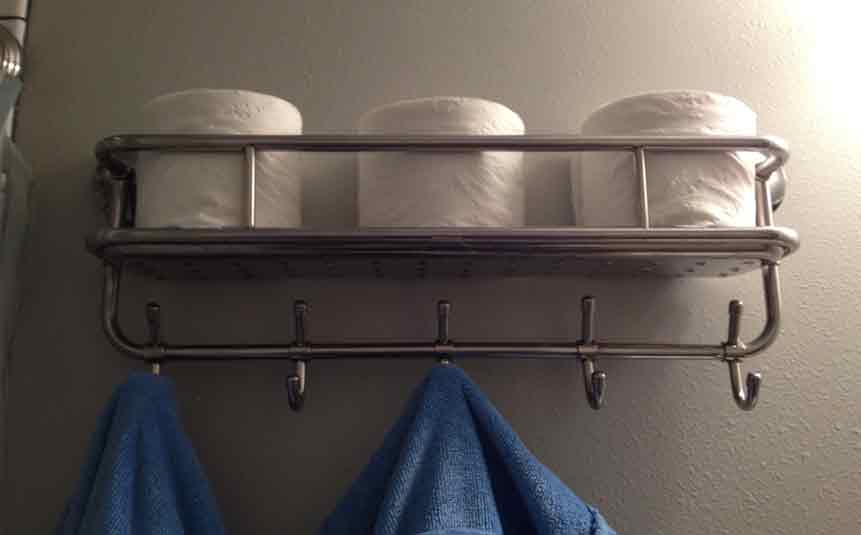 Hooks and racks in small bathroom