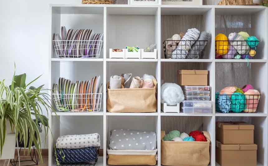 Neatly organized closet using boxes and hangers without buying new items