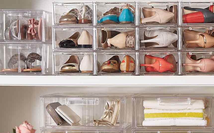 Shoeboxes and jars used as closet organizers