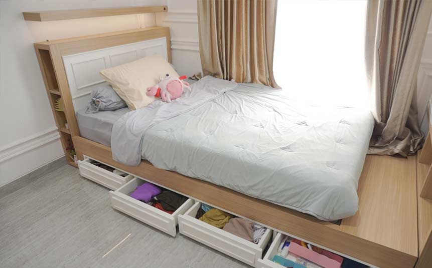Bed frame with hidden sliding drawer storage