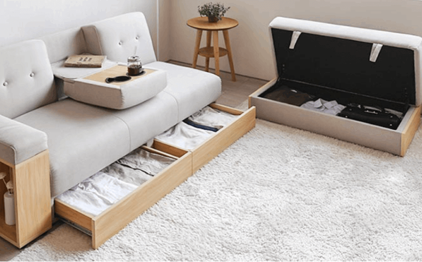 Convertible sofa bed with hidden storage in a tiny home