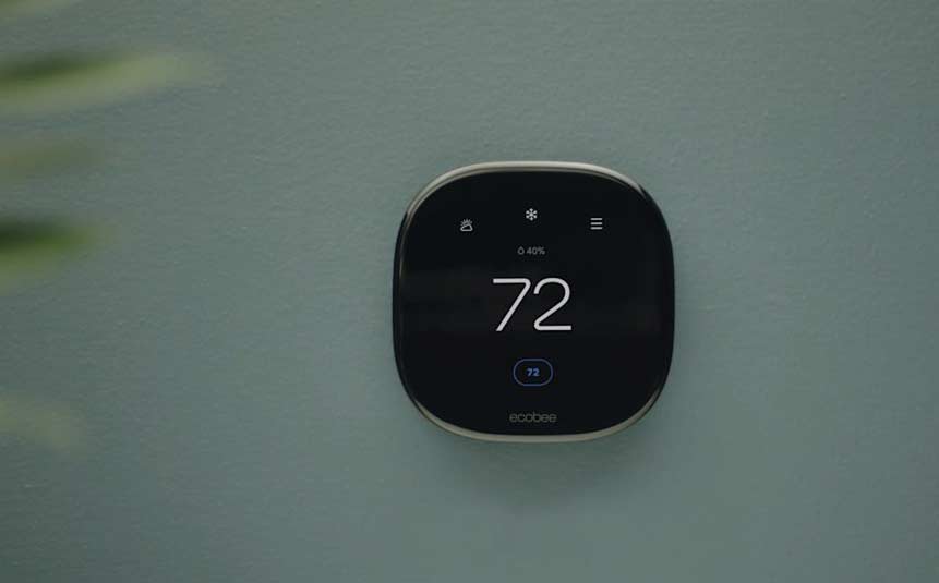 Ecobee smart thermostat showing indoor air quality data on screen