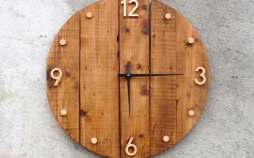 Oversized DIY wall clock made from wooden planks